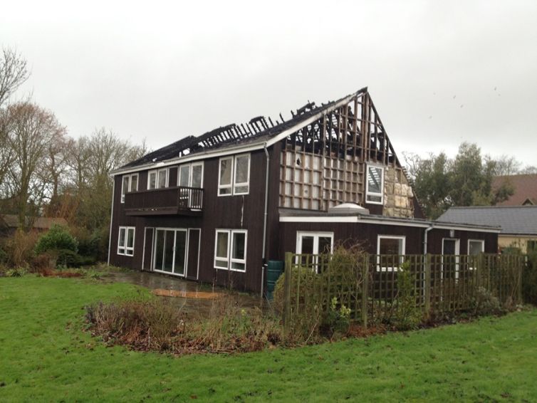 Rebuilding and restyling of existing dwelling severely damaged by fire, East Bergholt, Suffolk.
