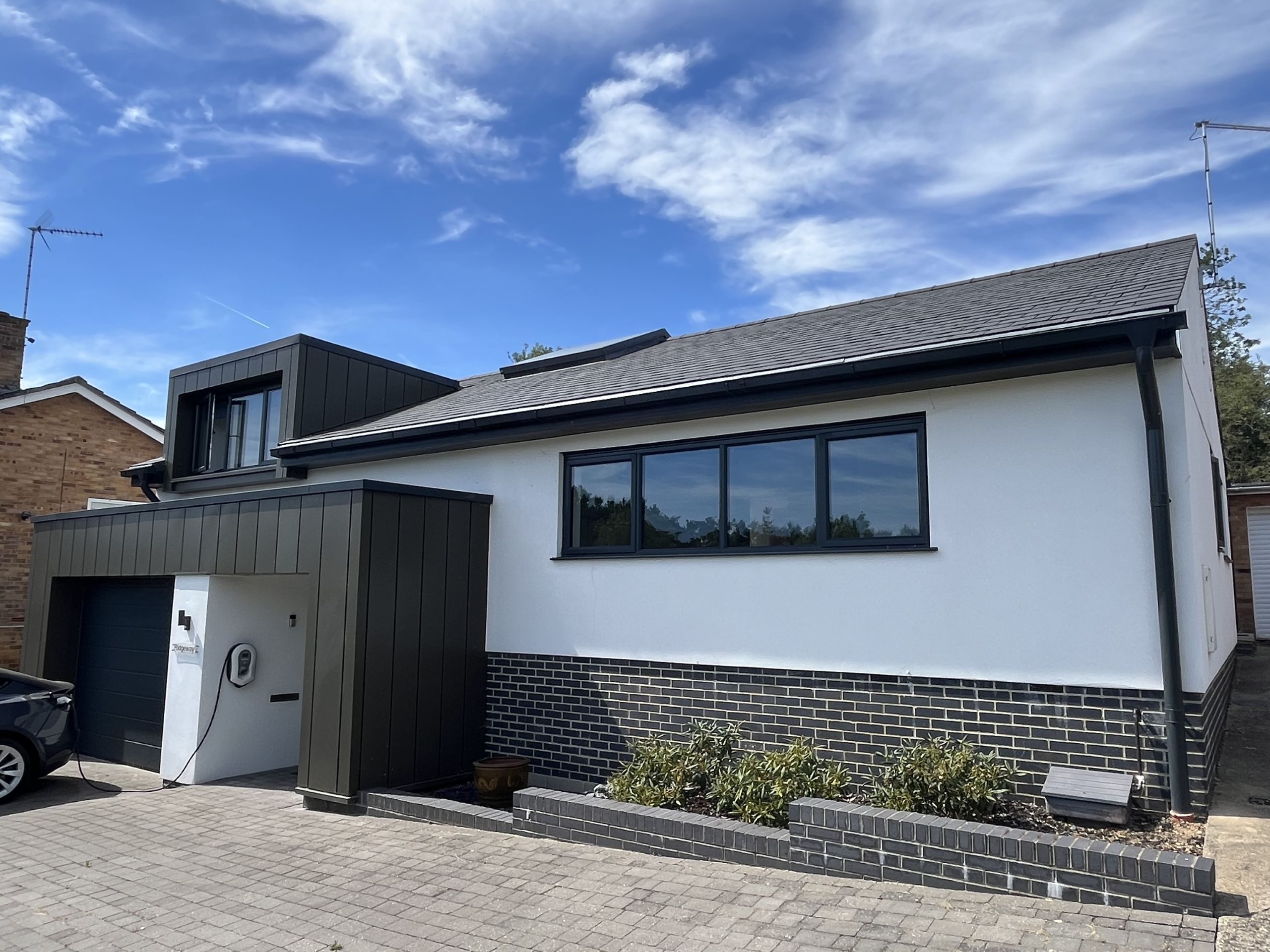 modern contemporary house zinc porch and dormer