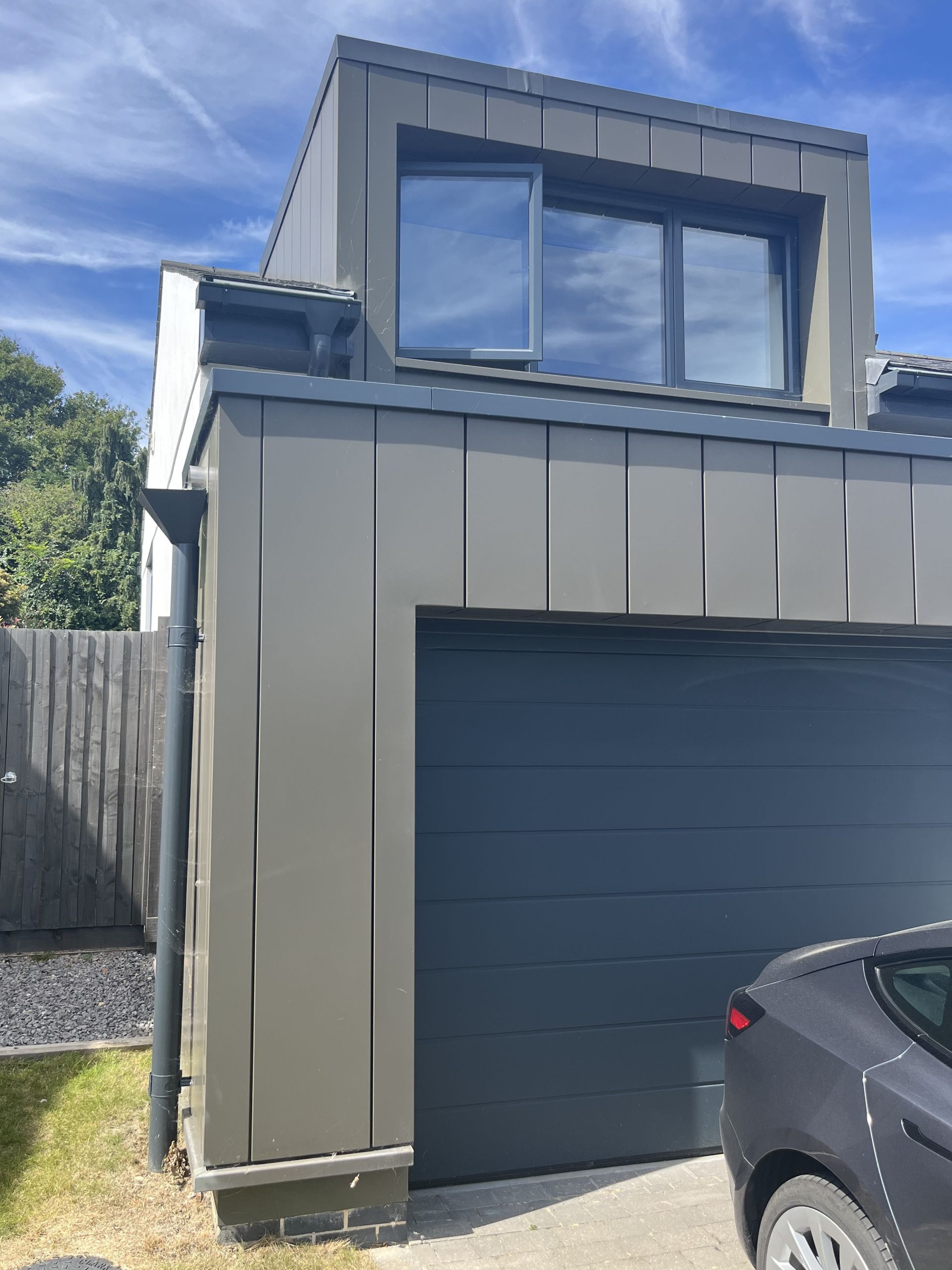 garage and dormer of a modern design architectural home