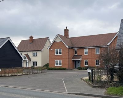 Newly built houses in Phase 1 of the residential project, showcasing traditional architecture style.