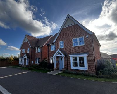 Newly built houses in Phase 1 of the residential project, showcasing traditional architecture style.