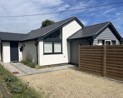 Front angle showing the finished renovation of the former doctor's surgery with a contemporary design.